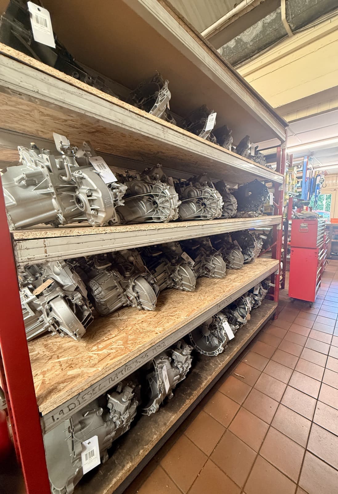 Reconditioned gearboxes and parts on the shelf at Top Gear Transmissions, Liverpool